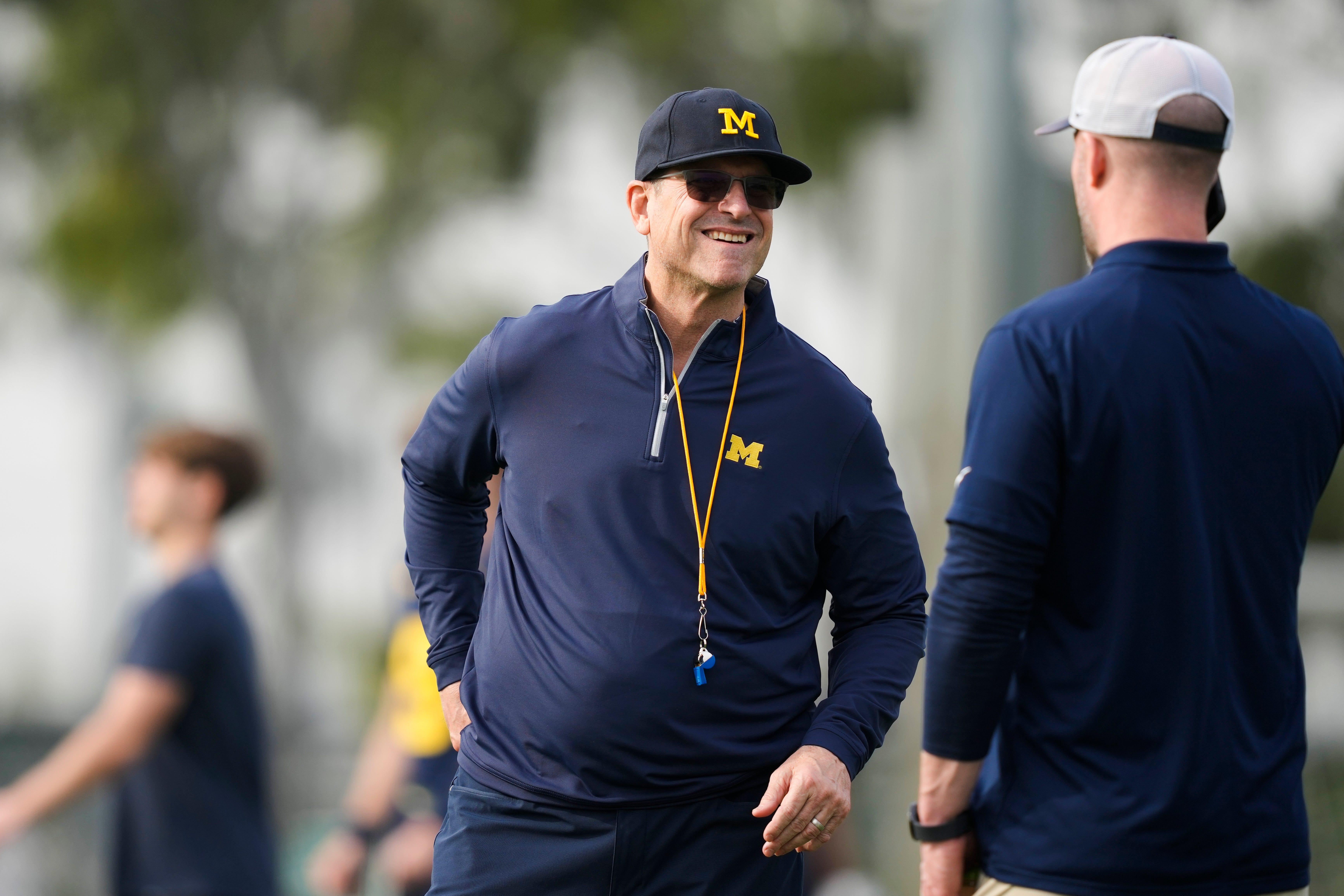 Michigan head coach Jim Harbaugh stands during practice on Friday, Dec. 29, 2023, in Carson, California.