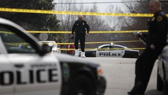 Springfield police at the scene of a double homicide in 2015.