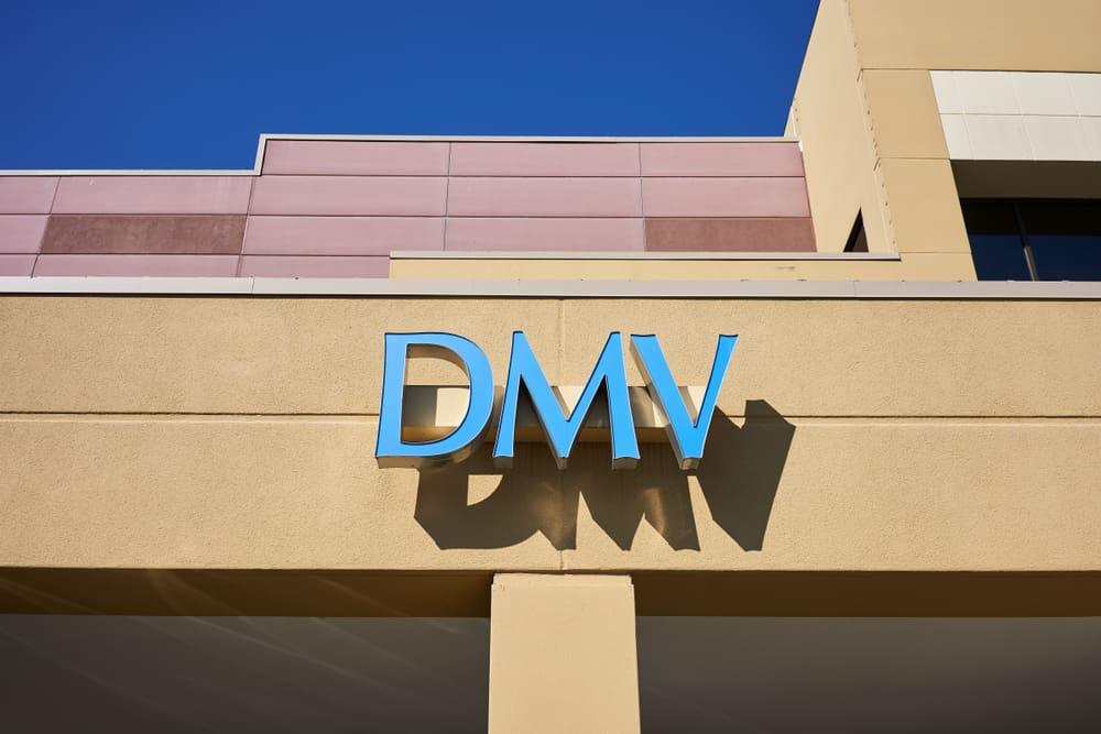 The DMV entrance sign