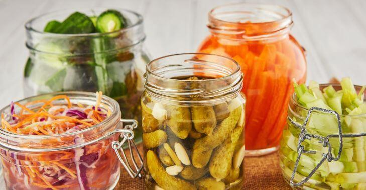 Sour pickled vegetables in jars.