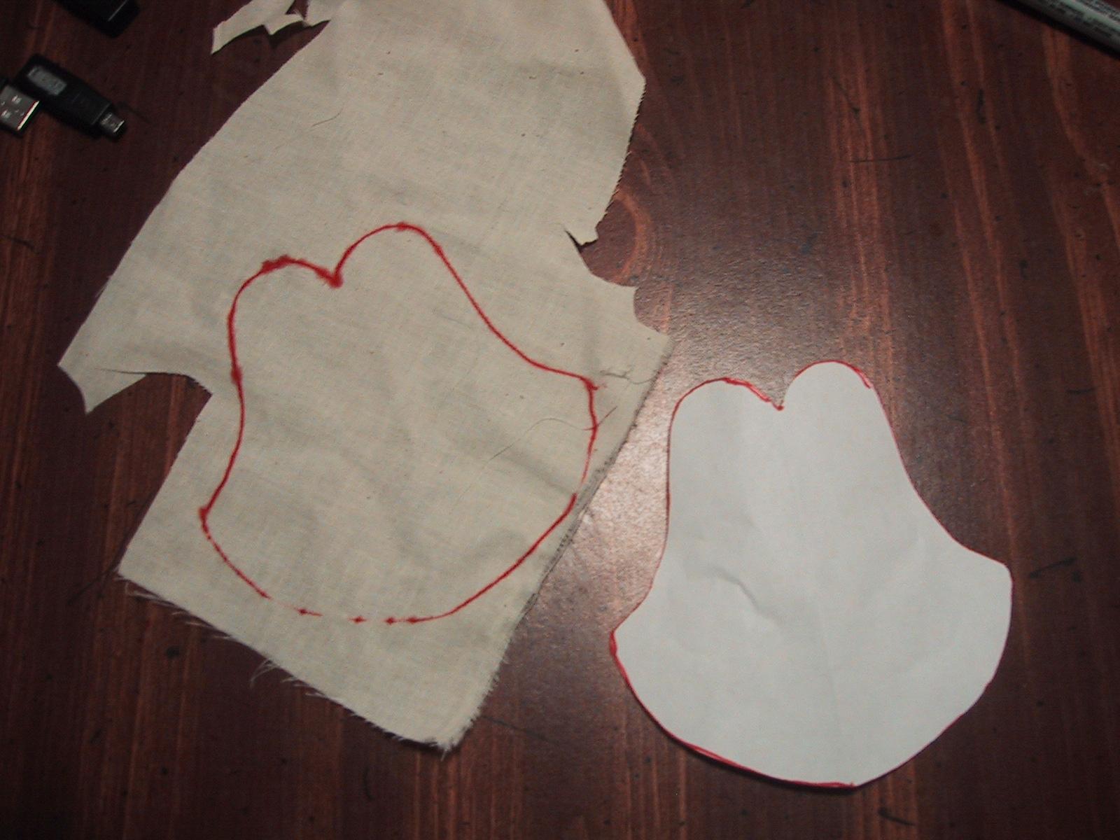 Muslin glove test parts being transfered to paper pattern pieces