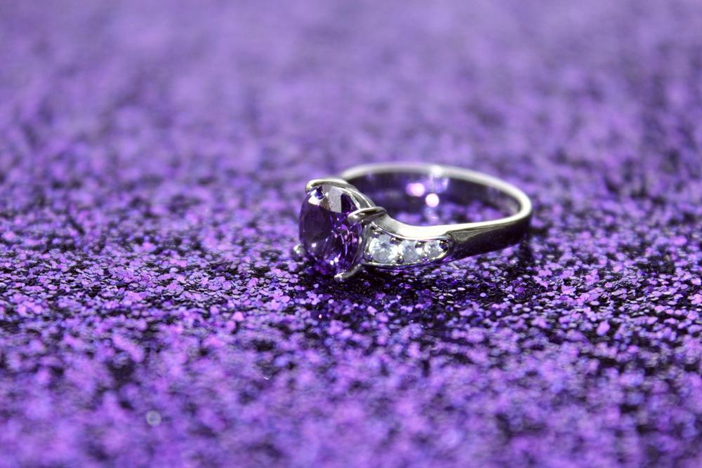 amethyst ring on purple background