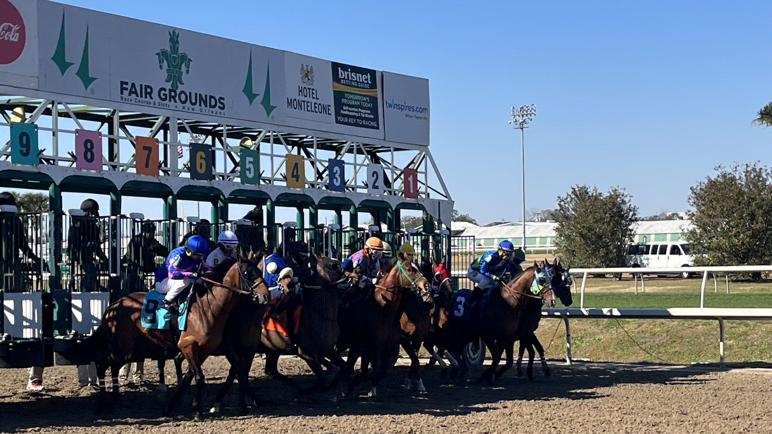 Picture of horse leaving the gates from their post position.