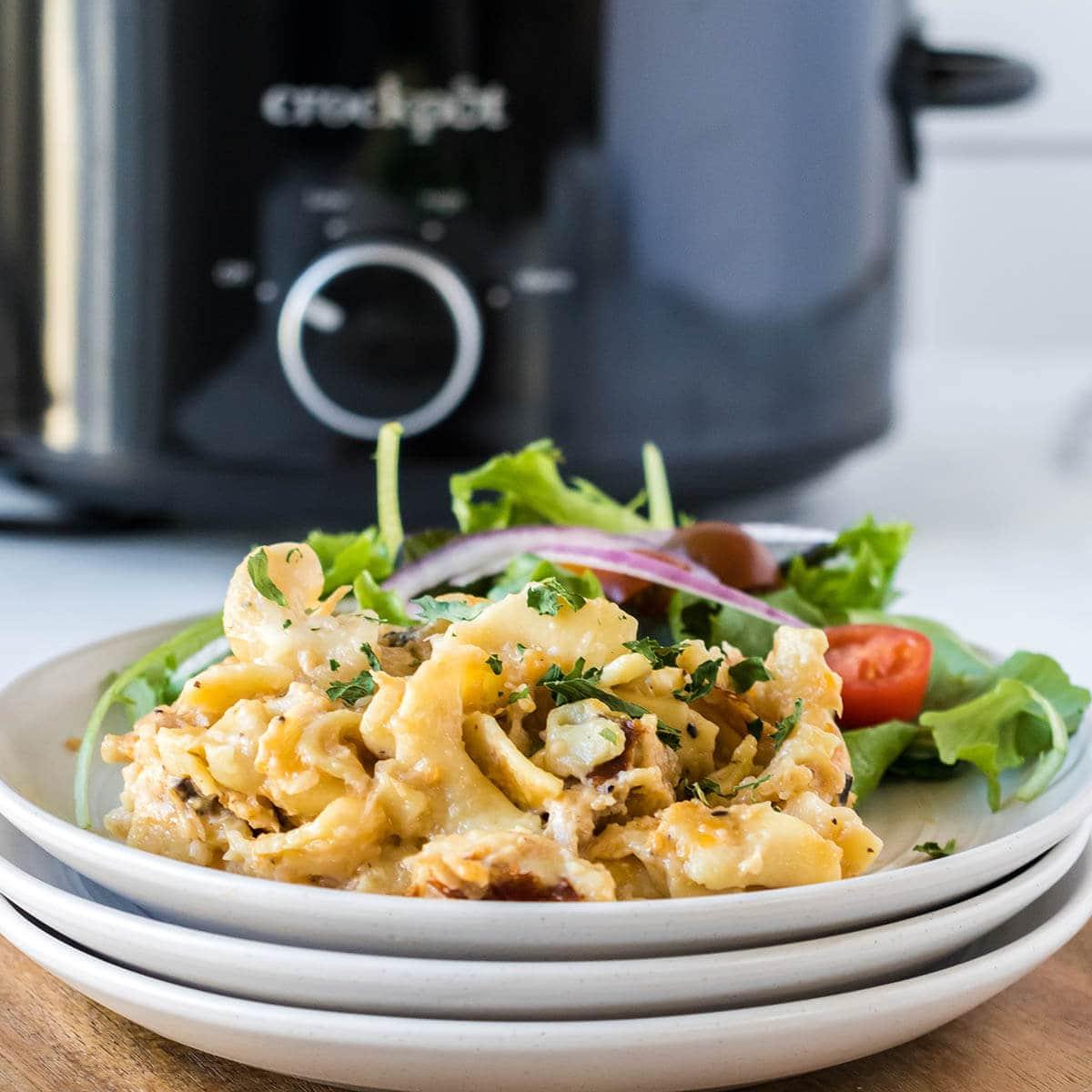 Tuna Casserole on plate with salad.