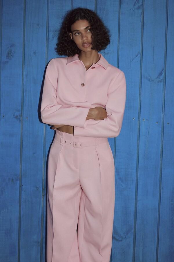 Zara model wearing pink pants and top for the Zara restock blog
