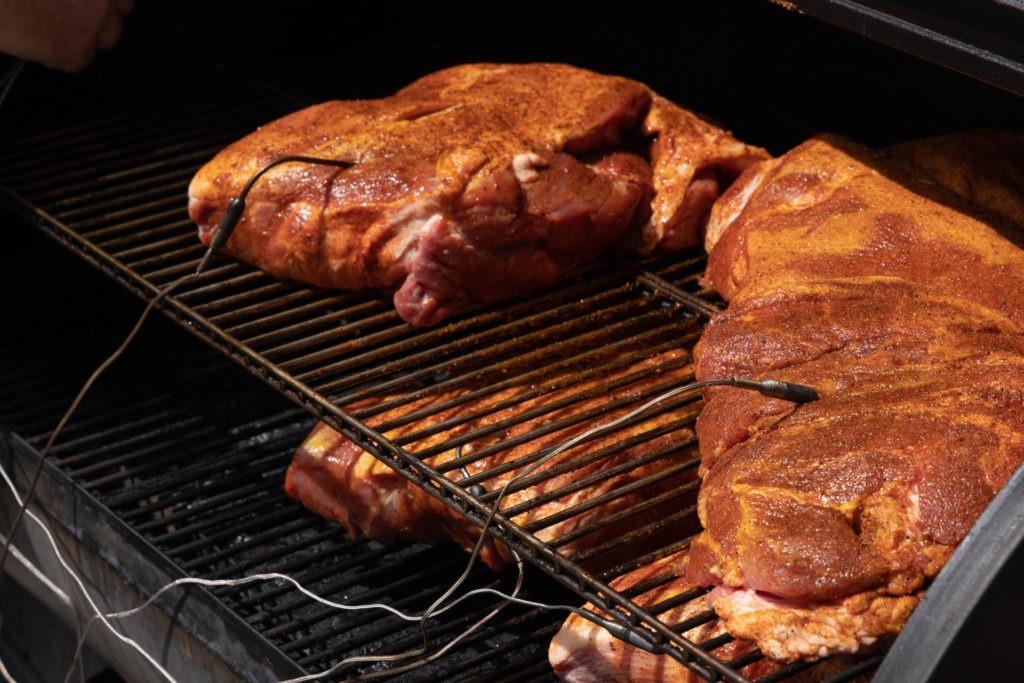 Seasoned butt in a smoker