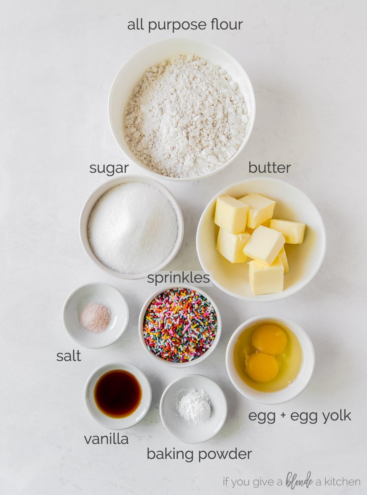 sprinkle sugar cookie ingredients in bowls
