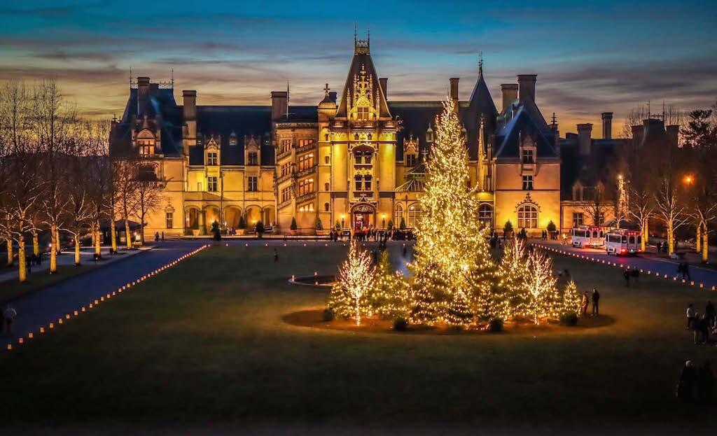 The Biltmore Mansion decked out in white Christmas tree lights