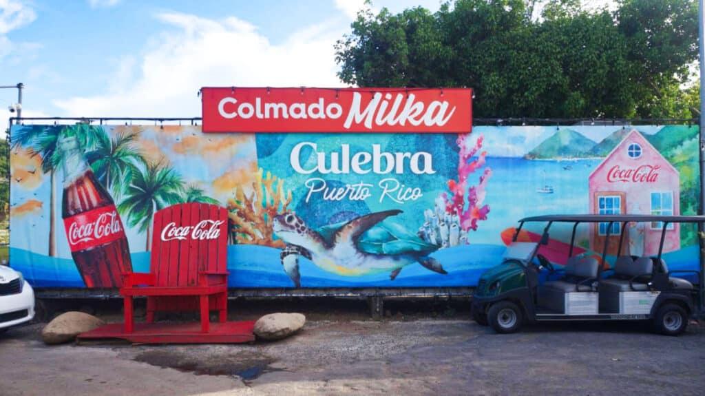 View of the seating area and huge artwork at the local mini market in Culebra