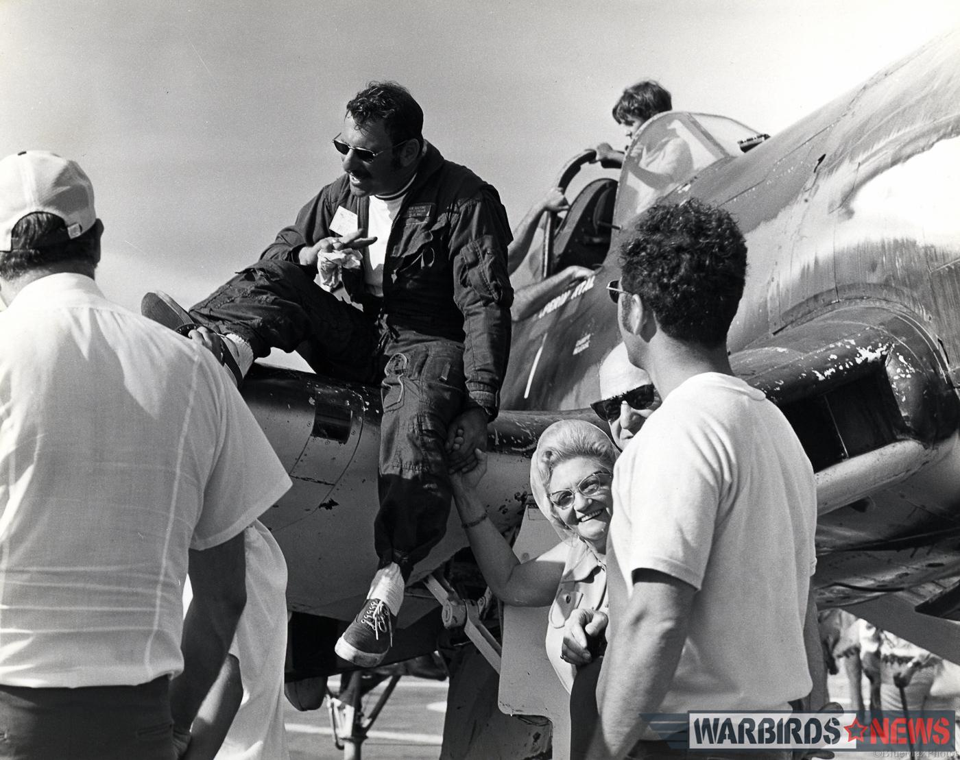 Bob Guilford sitting on the wing of his Corsair. (photo Steve Guilford)