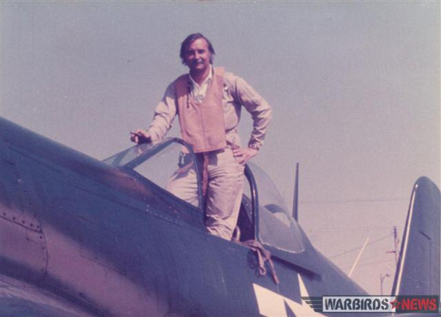 Tom Friedkin with his cigar standing in the cockpit of his Corsair on set. (photo by Dan Friedkin)