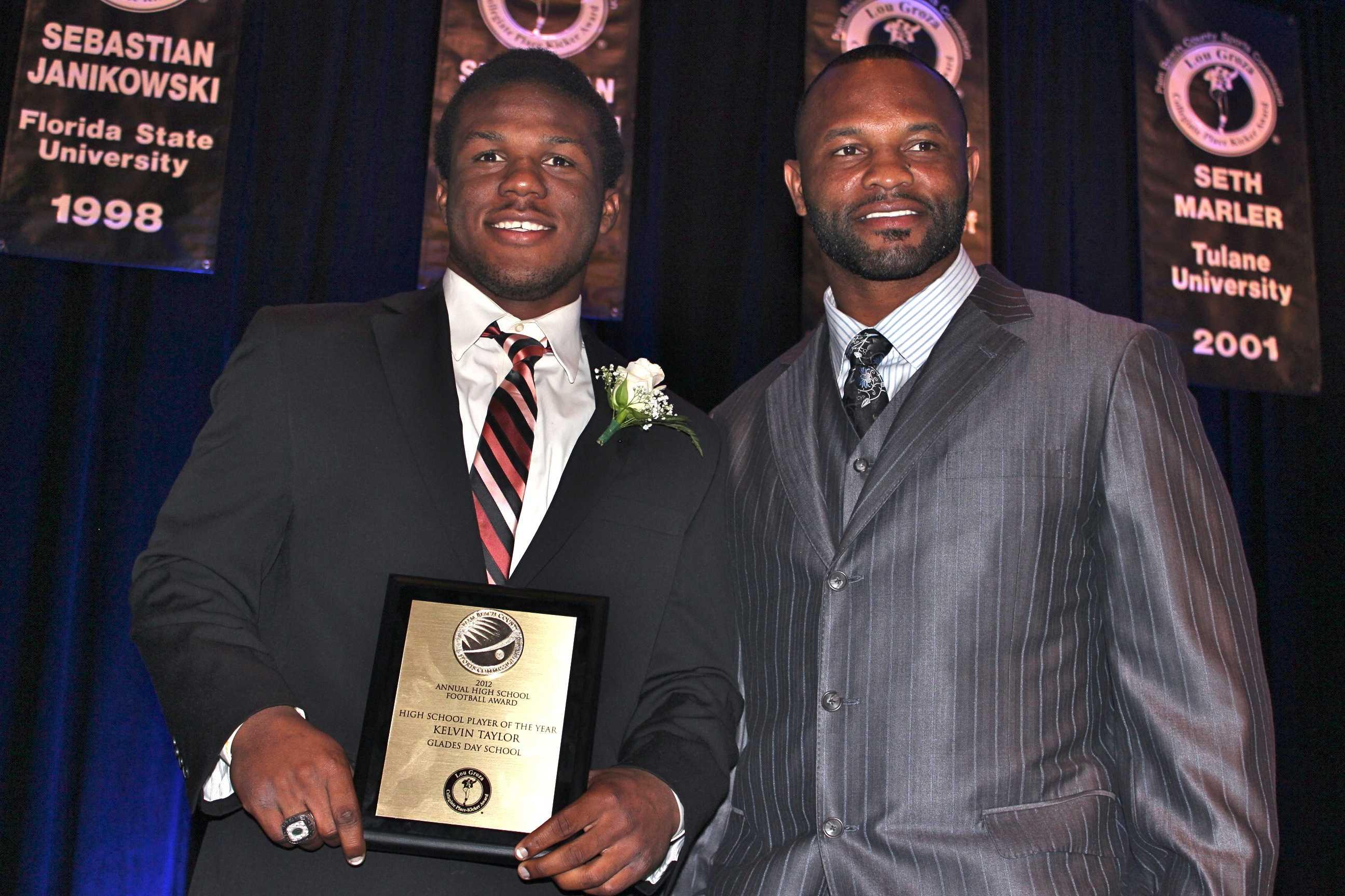 Retired NFL running back, son share award