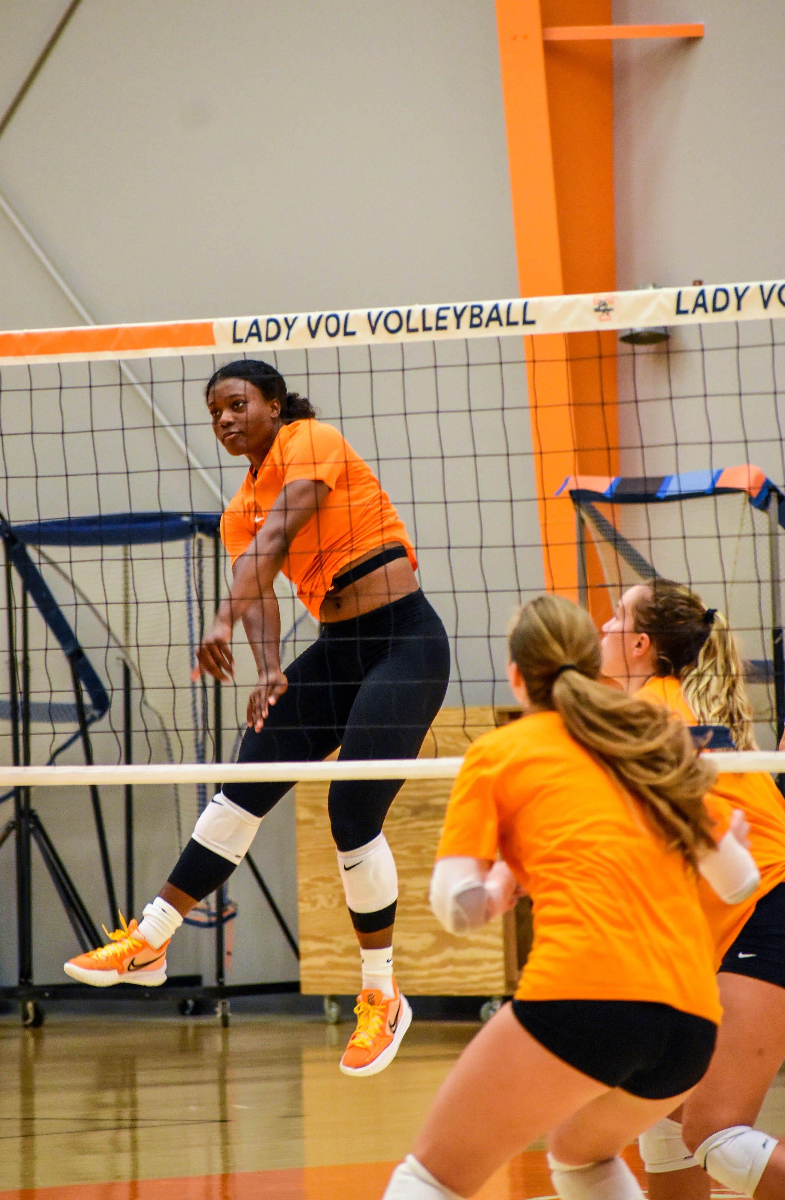Junior right side hitter Morgahn Fingall goes for a kill in practice on Wednesday, Sept. 22. She is one of the players who has opted to wear longer leggings on and off this season instead of spandex shorts.