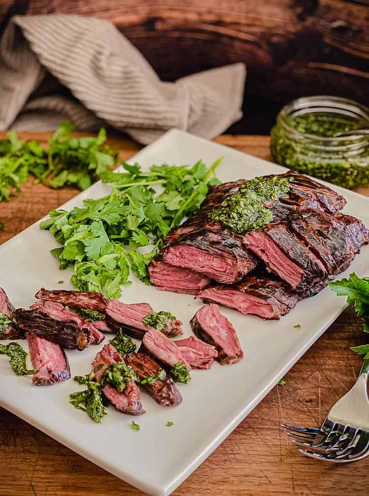 long, thick strip of meat next to shorter inside cut with hard fat membrane