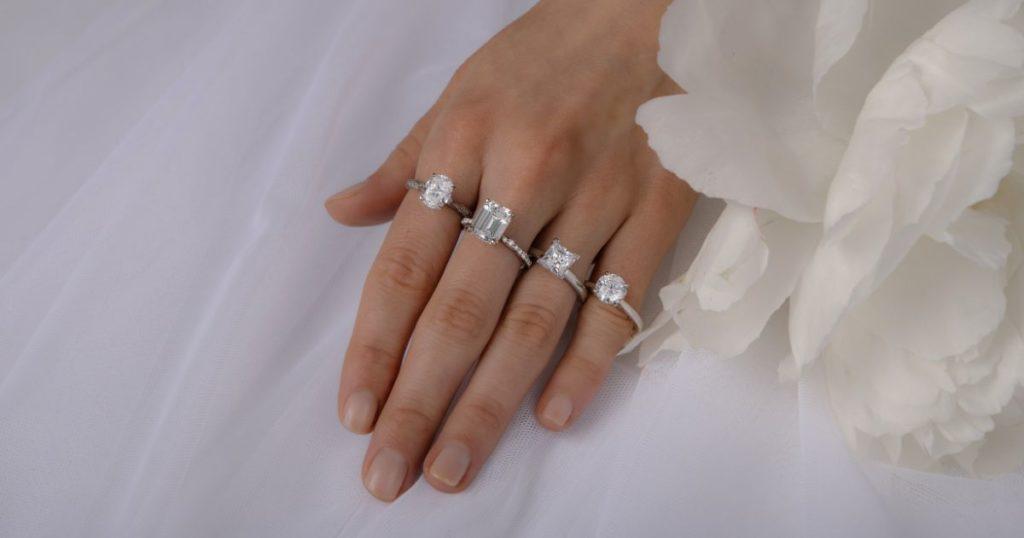 model wearing 4. diamond rings