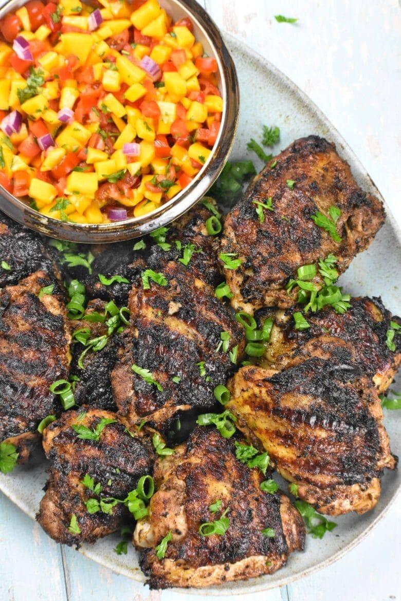 Grilled chicken with mango salsa, habanero peppers.