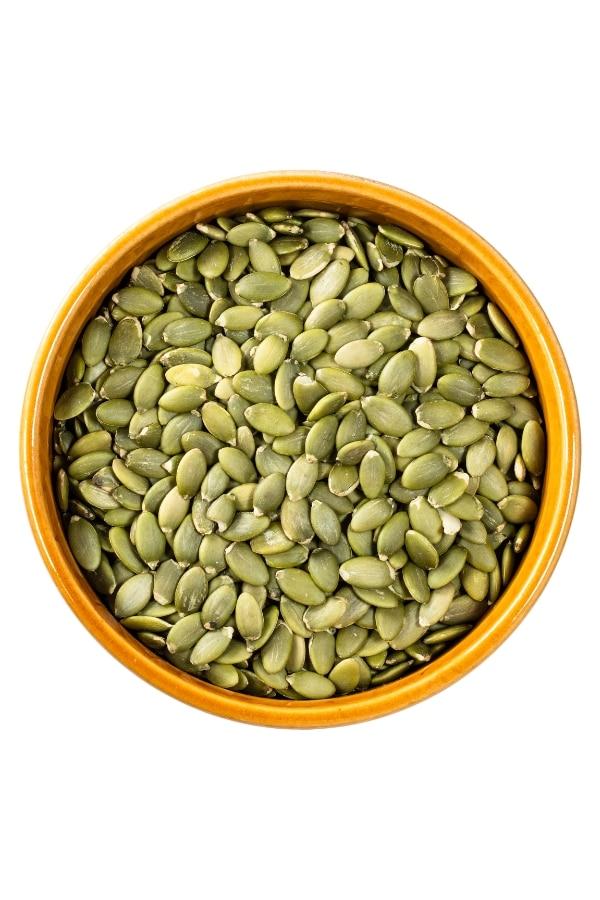 A bowl of pumpkin seeds.