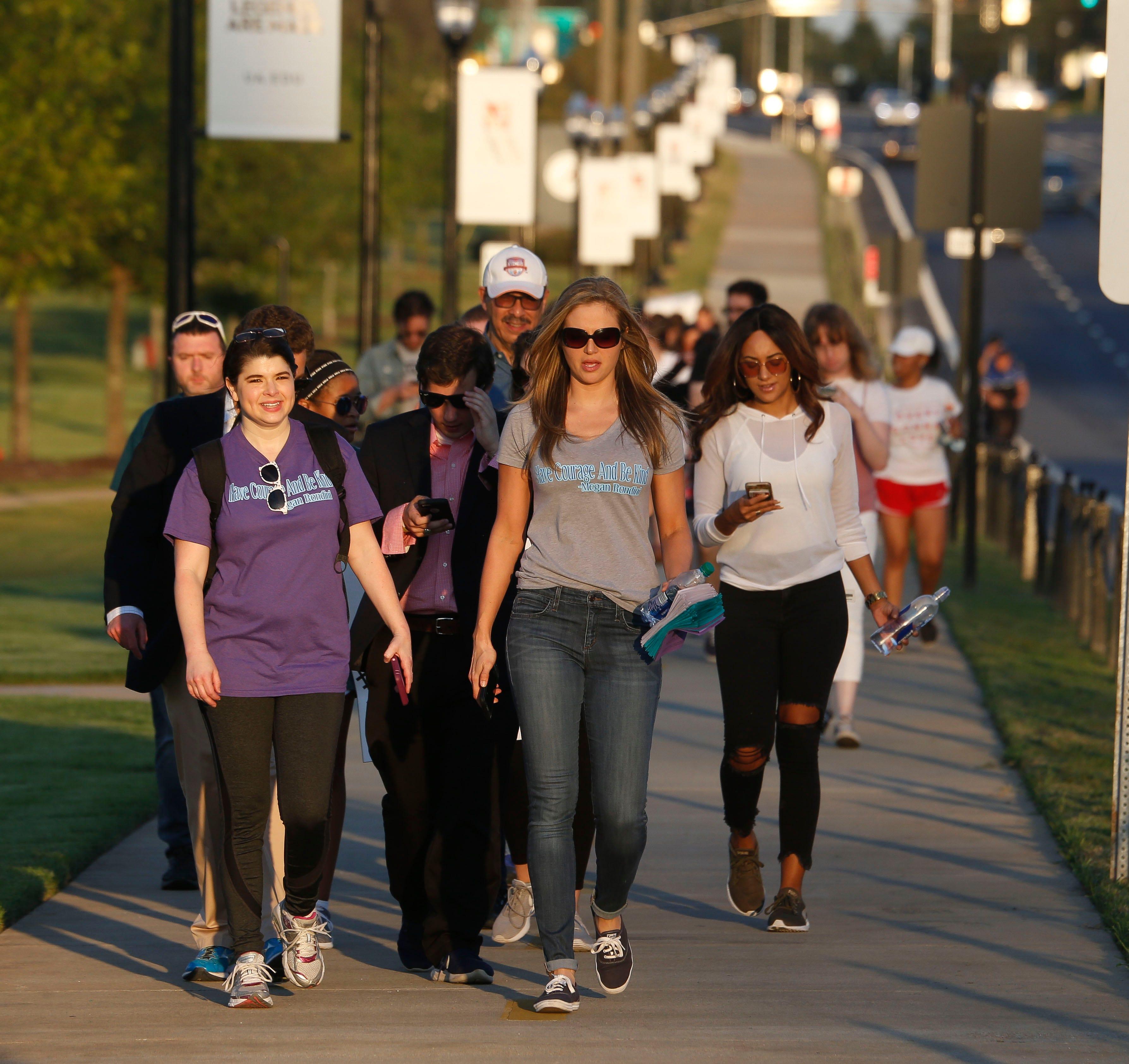 People gather and march in support of Megan Rondini along University Blvd. in Tuscaloosa Friday, September 8, 2017. [Staff Photo/Gary Cosby Jr.]