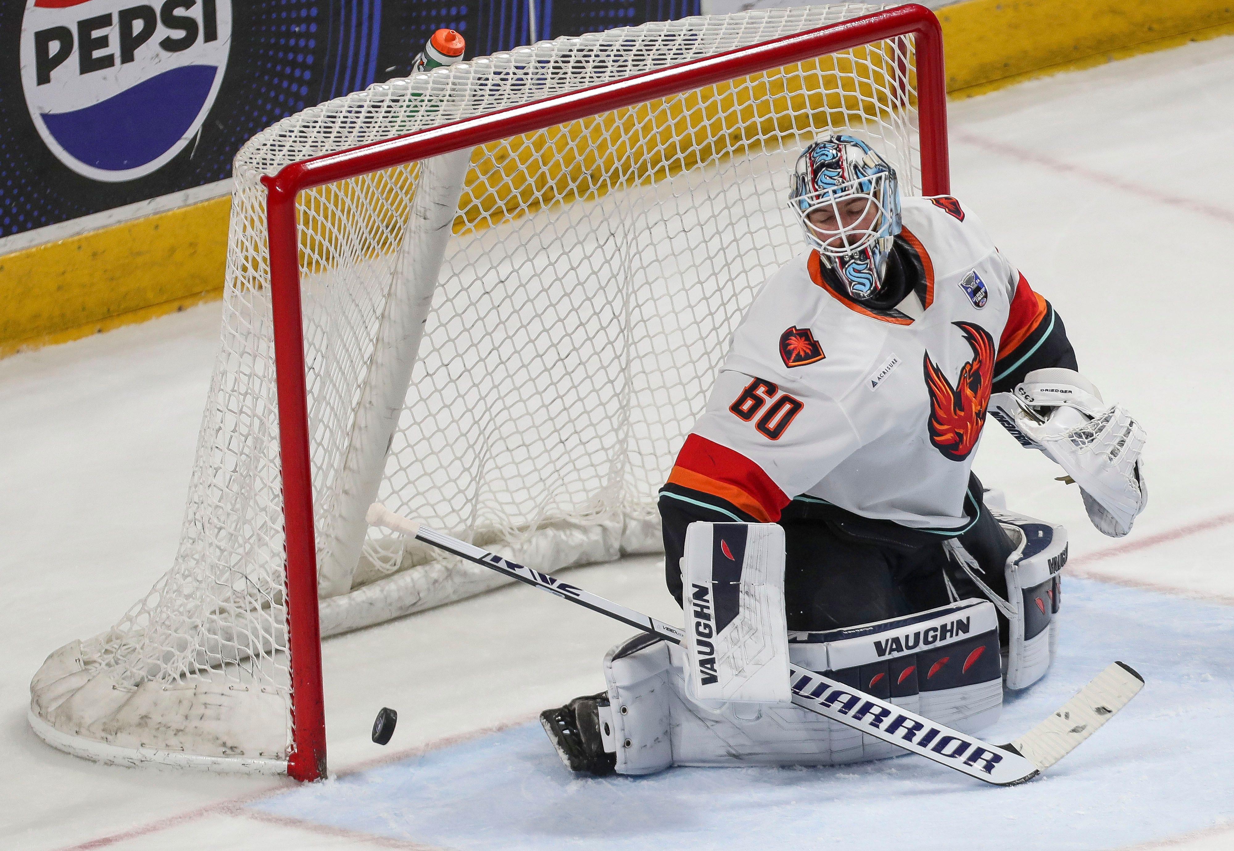 Coachella Valley Firebirds goalkeeper Chris Driedger watches as the puck gets by for the Hershey Bears third goal during Game 6 of the AHL Calder Cup at the Giant Center in Hershey, Pa., June 24, 2024.