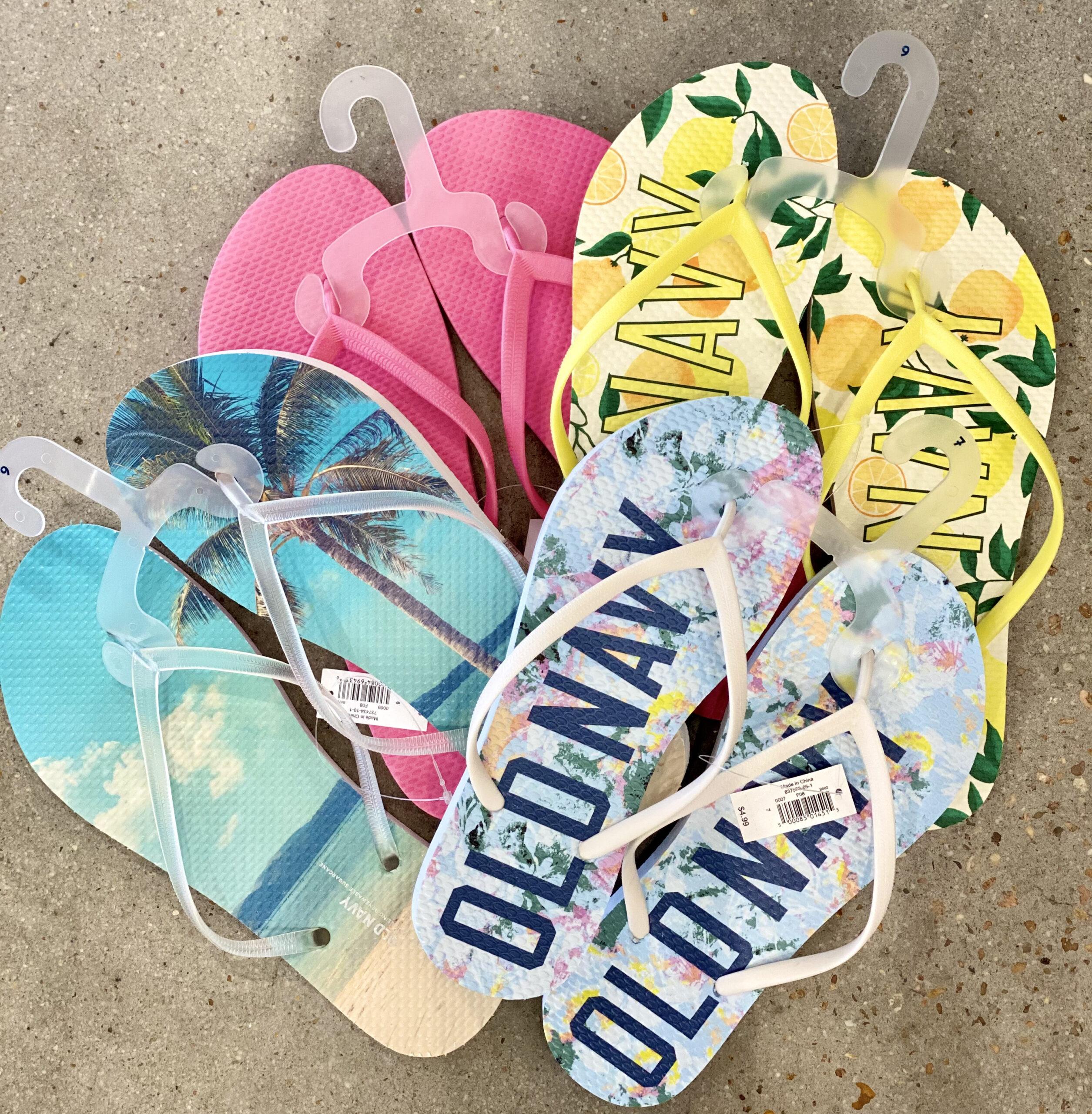 colorful flip flops at Old Navy sitting in a circle on floor of store