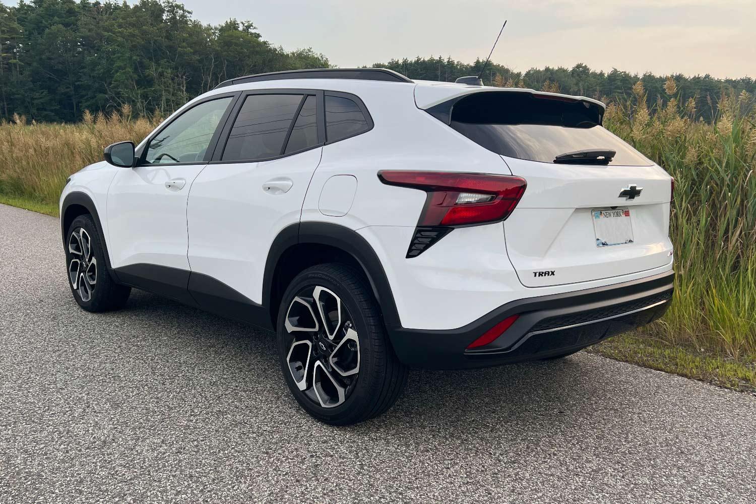 Rear three-quarter view of a white 2024 Chevrolet Trax